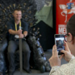 Selfies with the replica Iron Throne at IMC 2017