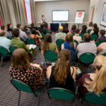 A busy seminar room during IMC 2019.