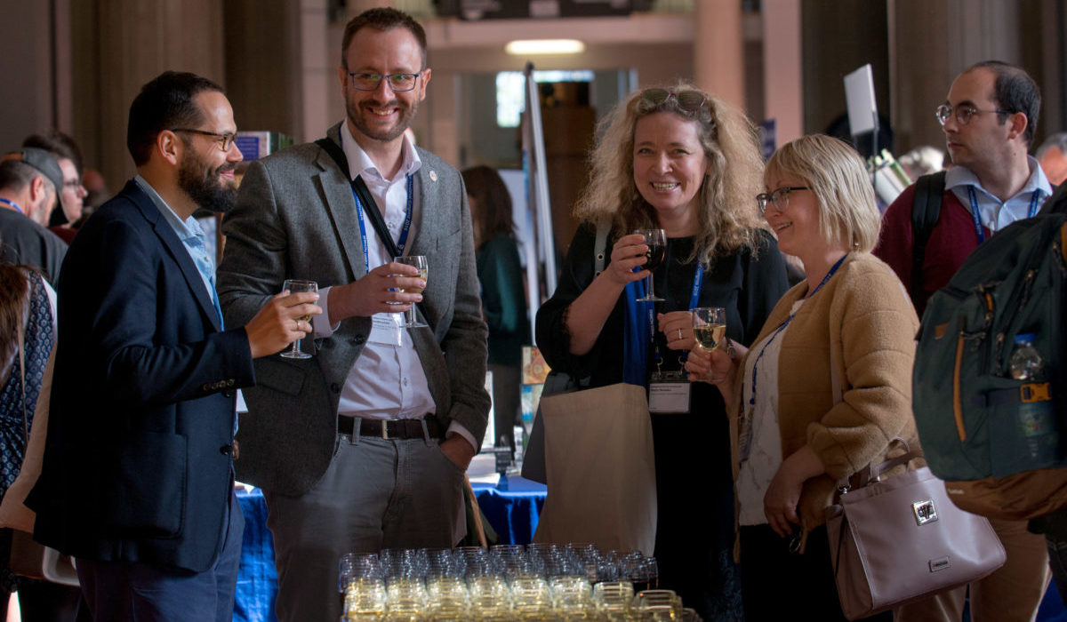 Delegates socialising at IMC 2019.