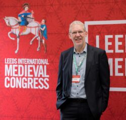 IMC Director, Axel E W Müller, talking to a Keynote speaker at a previous IMC.