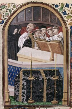 A medieval manuscript picture of monks stood in front of an altar with book singing.
